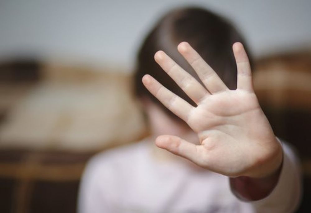 Fearful teen facing abuse trauma