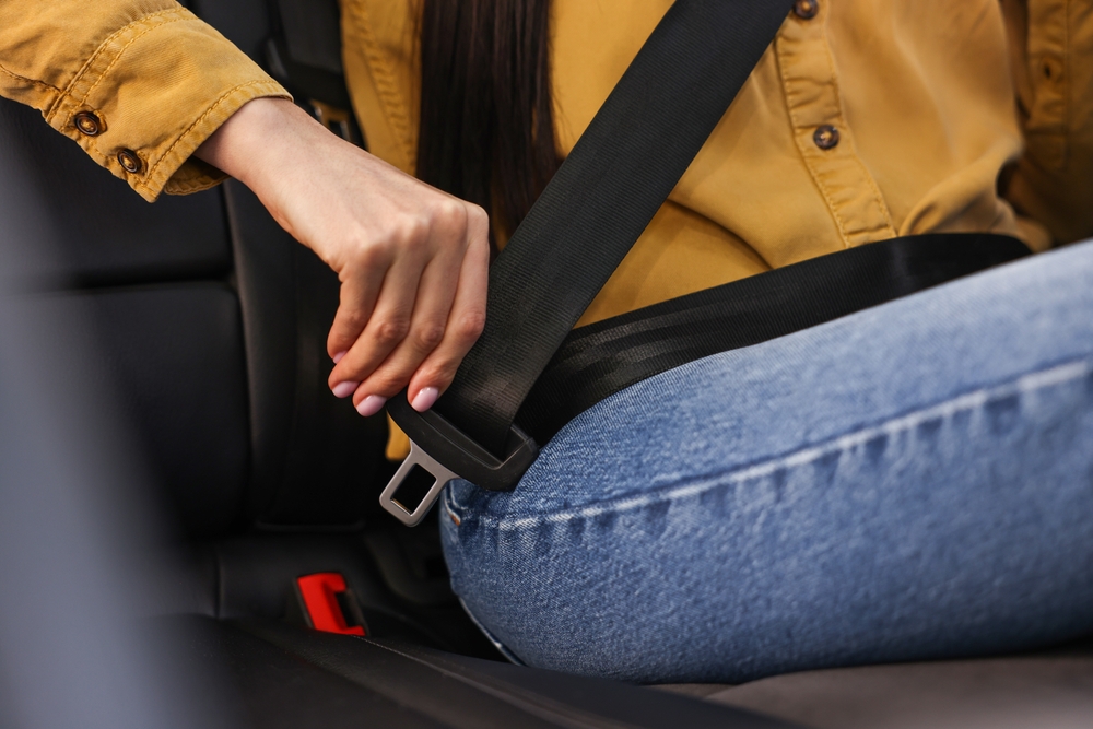 Seat Belt Woman Fastening Seat Belt