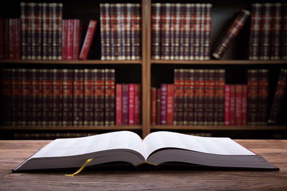 Legal Options Photo of a book standing on the wooden table