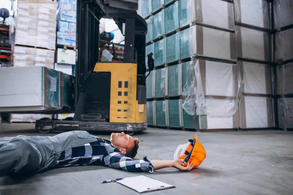 Worker Lying on the Floor After Workplace Injury